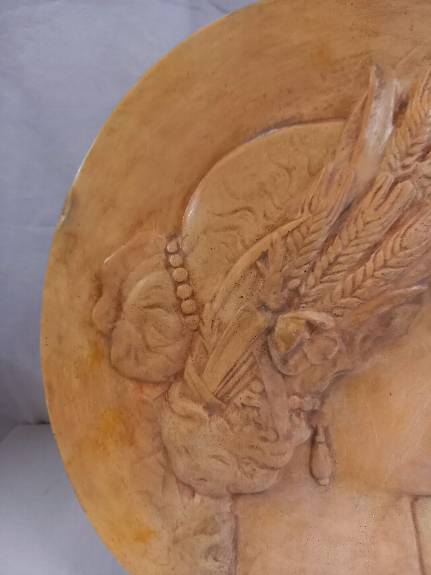 Plaster medallion, high relief, yellow ochre patina, representing the Roman divinity Ceres