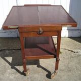 A rolling table with a removable tray