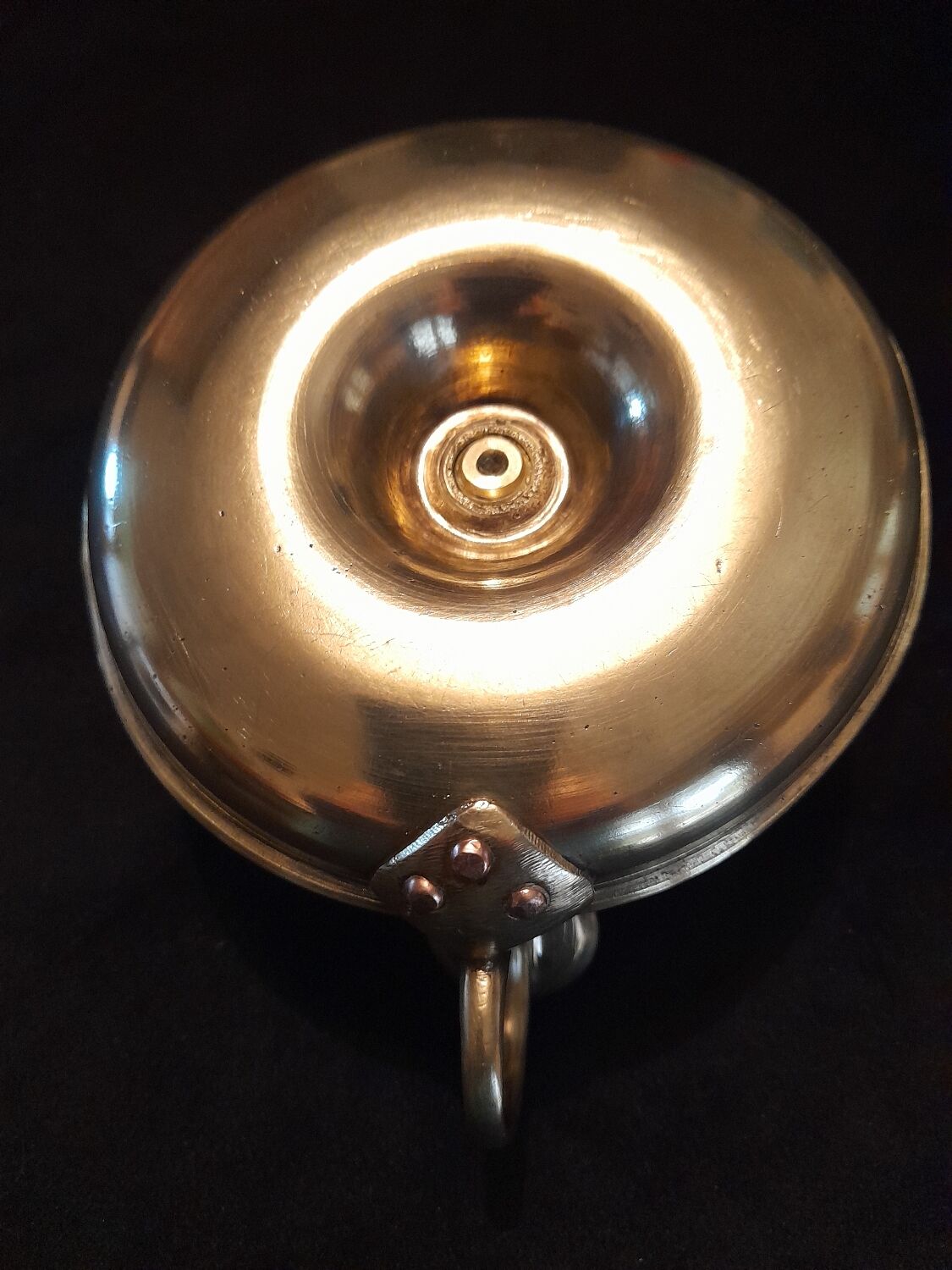 Tailed candle holder.
