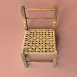 Vintage children's chair made of rope and wood