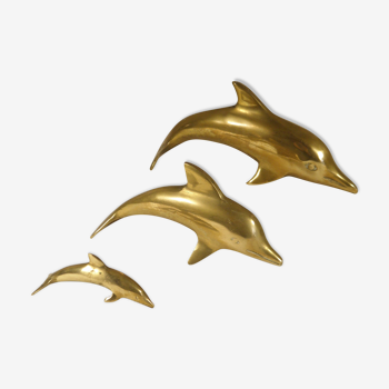 Trois dauphins en laiton