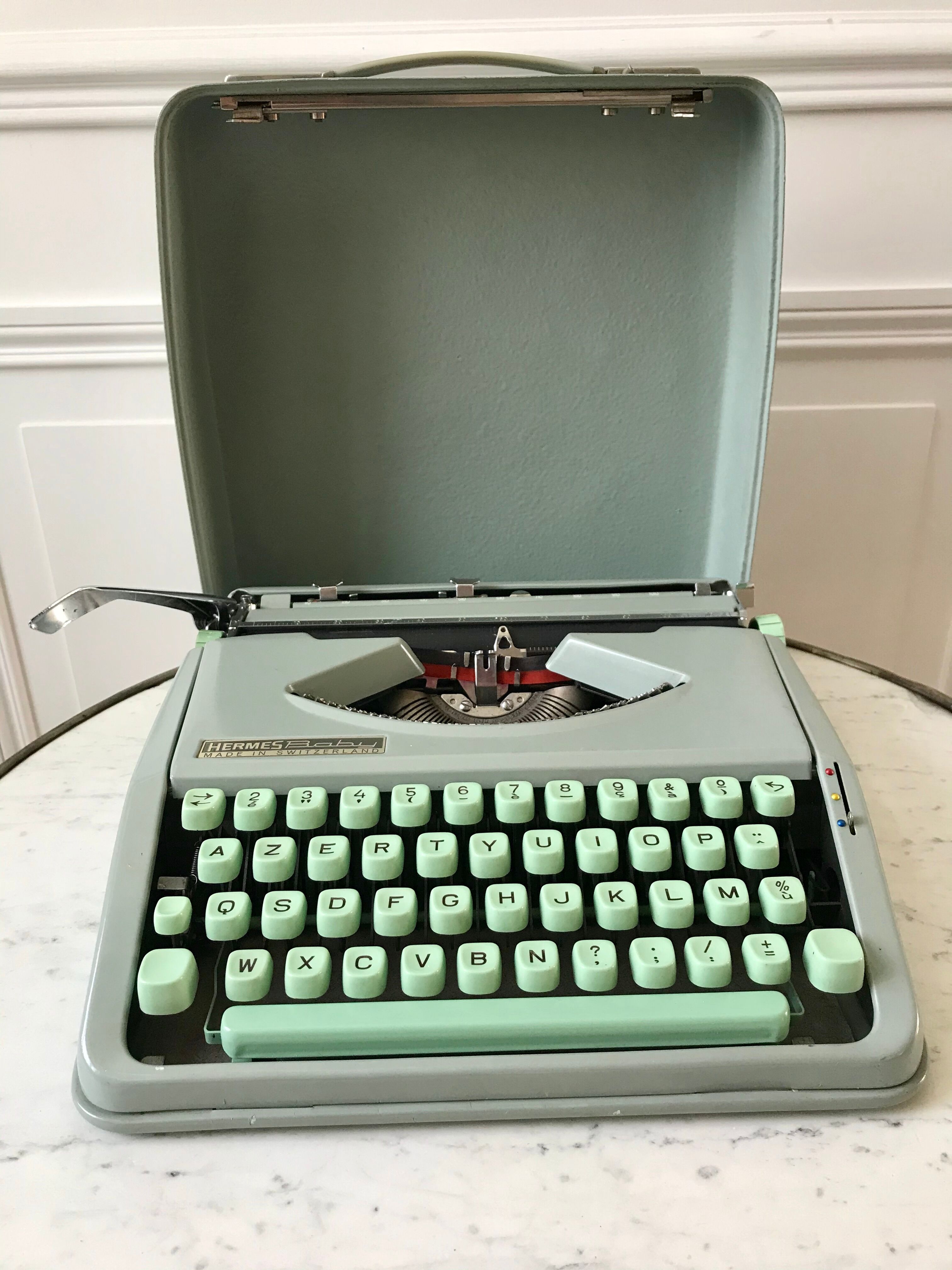 Mint green typewriter hermes baby made in switzerland