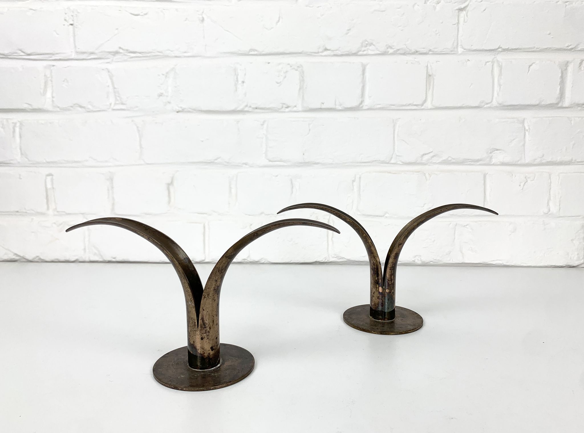 Pair of Lily brass candle holders, Ystad Metall, Sweden, design Ivar Ålenius Björk