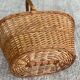 Round woven wicker basket with handle