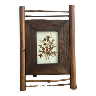 Wooden and bamboo frame with dried flowers