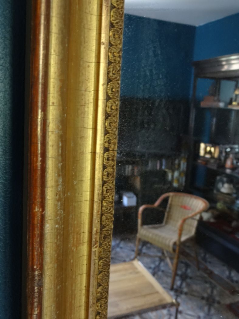 Mirror Empire, early nineteenth, gilded with leaf, h 56 cm