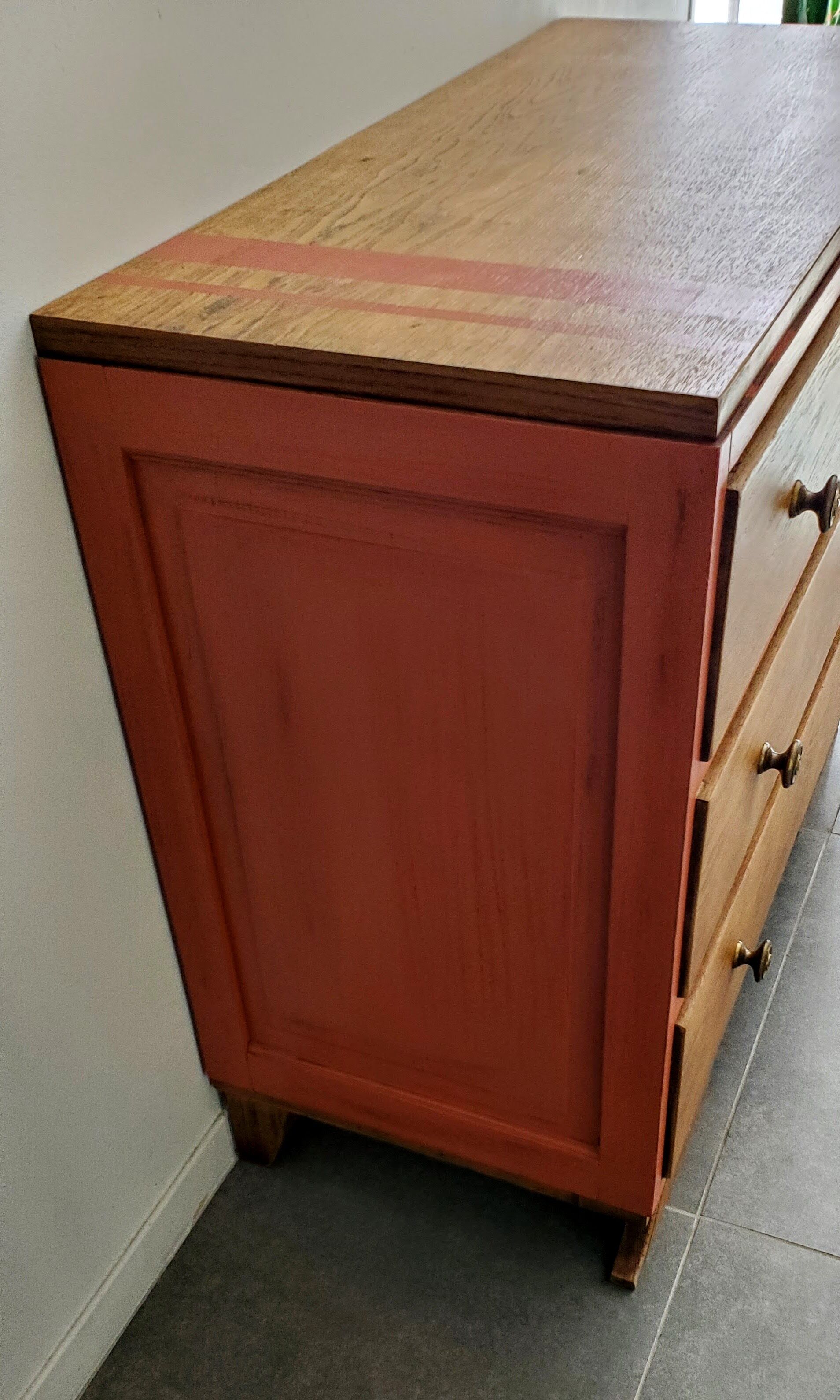 Terracotta patina oak chest of drawers