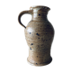 Pitcher in sandstone pyrity signed