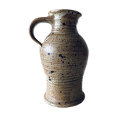 Pitcher in sandstone pyrity signed