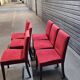 6 red fabric chairs