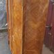 Two-door cabinet with marquetry floral design from the early 20th century.