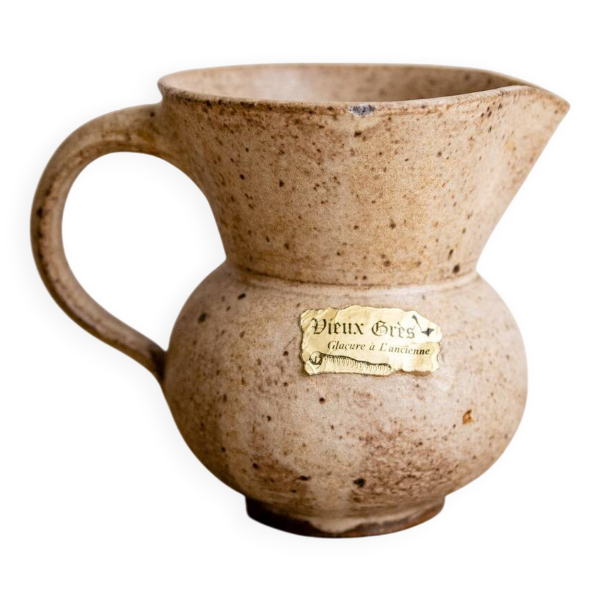 Small pitcher in old speckled stoneware