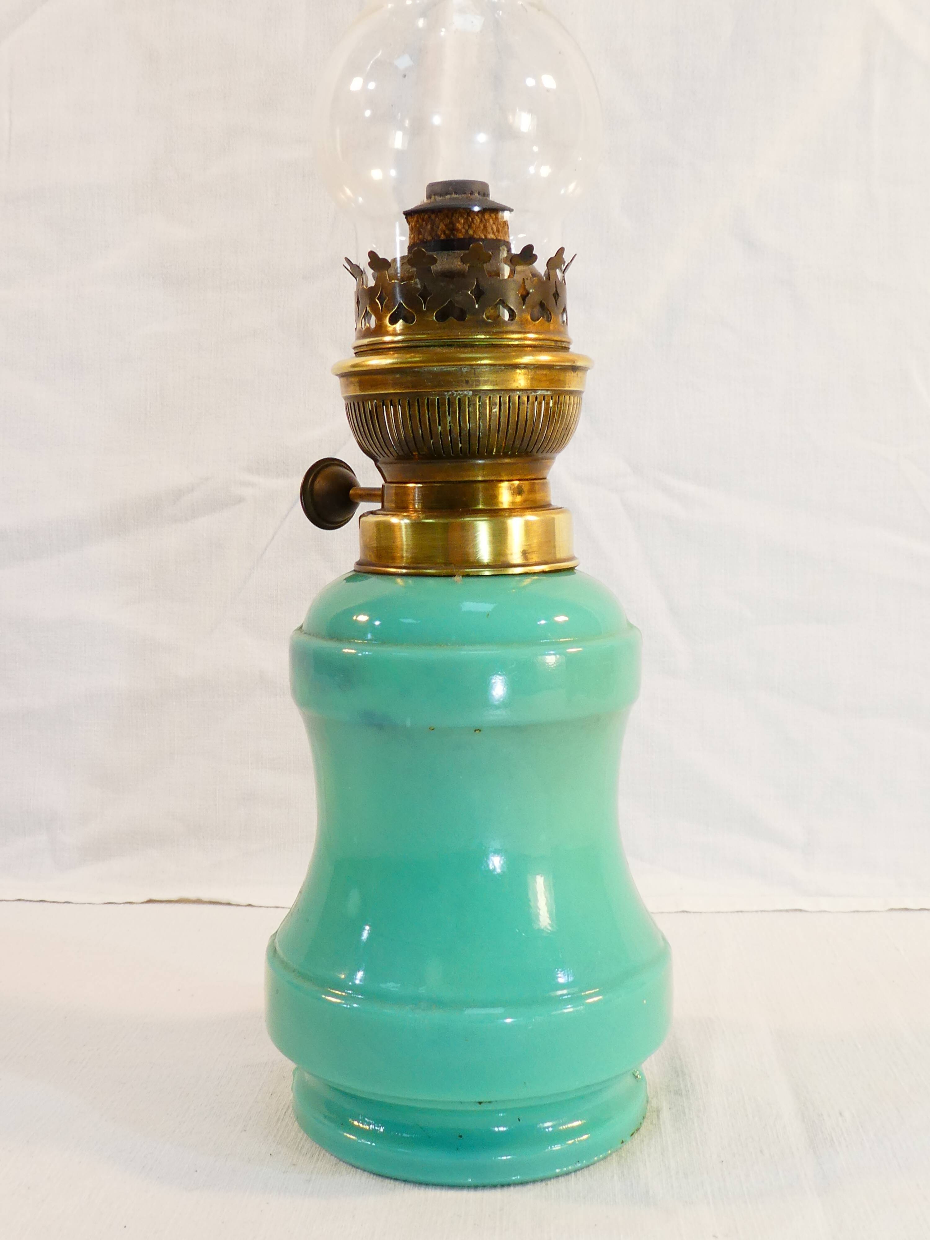 Ancient lampe a petrole in green opaline