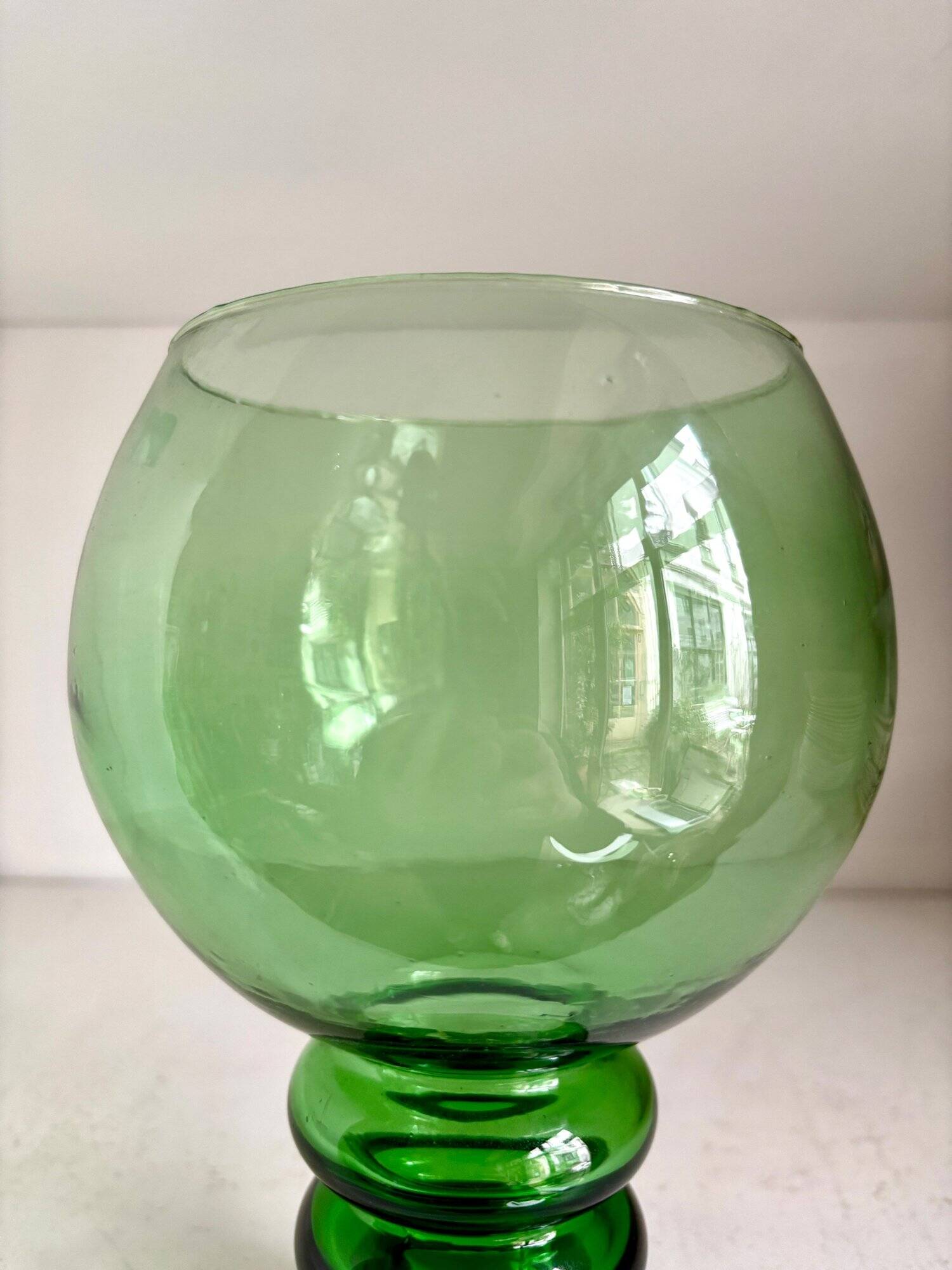 Green glass ball vase