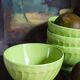 Four vintage spring green earthenware bowls