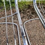 Set of 6 designer chairs in chromed metal from the 1970s