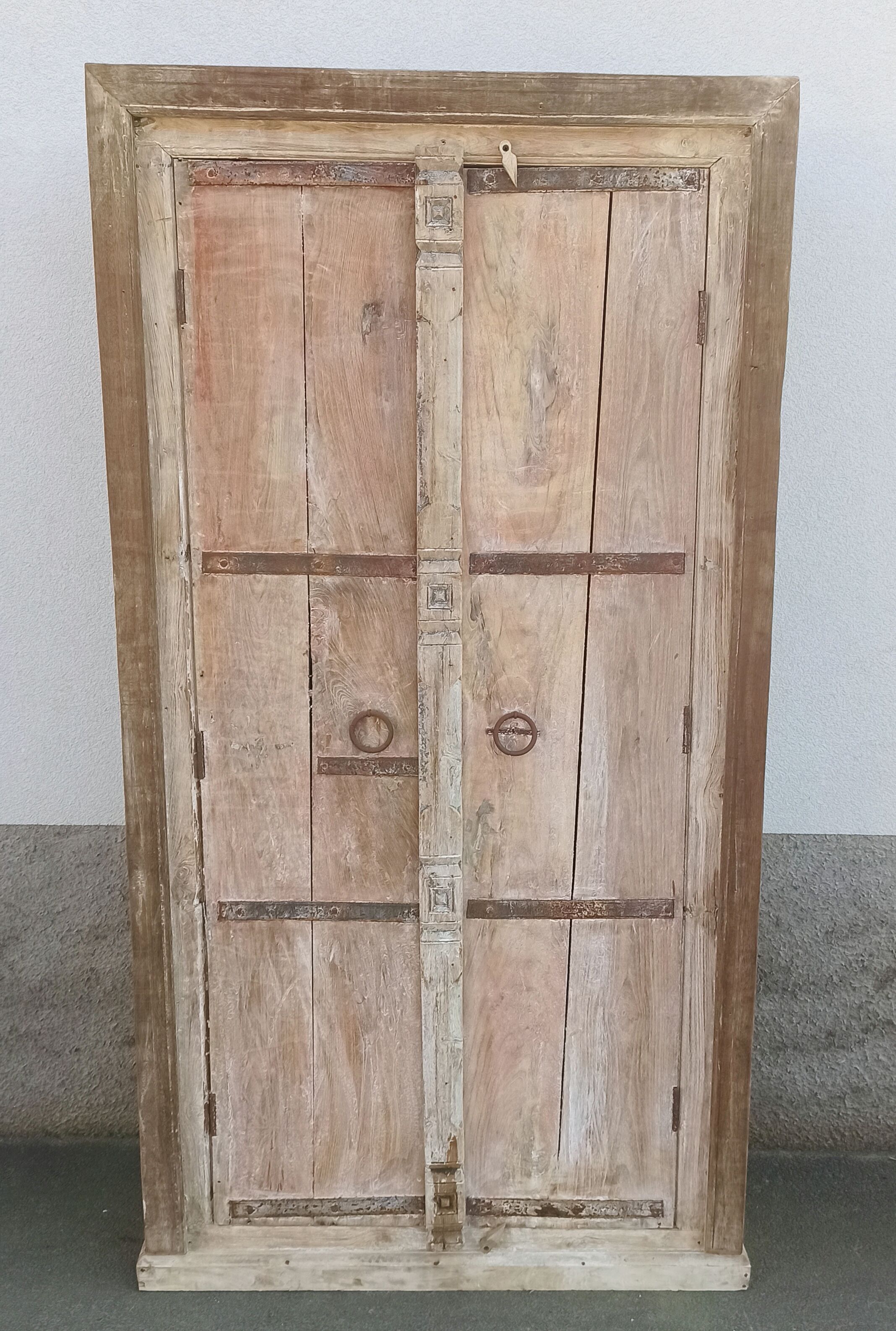 Wooden wardrobe with antique doors