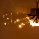 Radiant glass tube chandelier. Contemporary design.