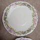 Set of 5 Limoges porcelain dessert plates in Art Nouveau style.