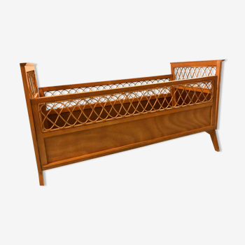 Vintage baby bed in rattan and wood