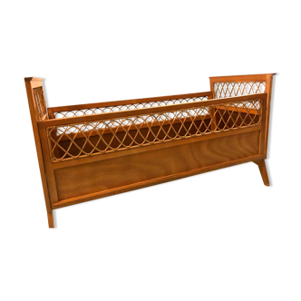 Vintage baby bed in rattan and wood