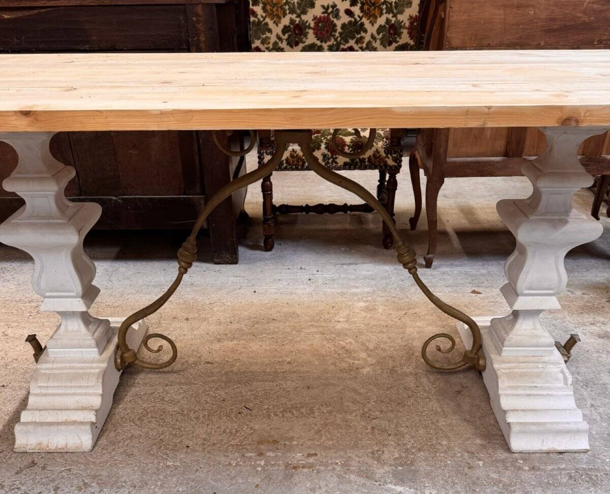 Industrial table with sandblasted top and bleached legs.