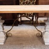 Industrial table with sandblasted top and bleached legs.