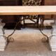Industrial table with sandblasted top and bleached legs.