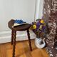 Tabouret tripode en bois tourné