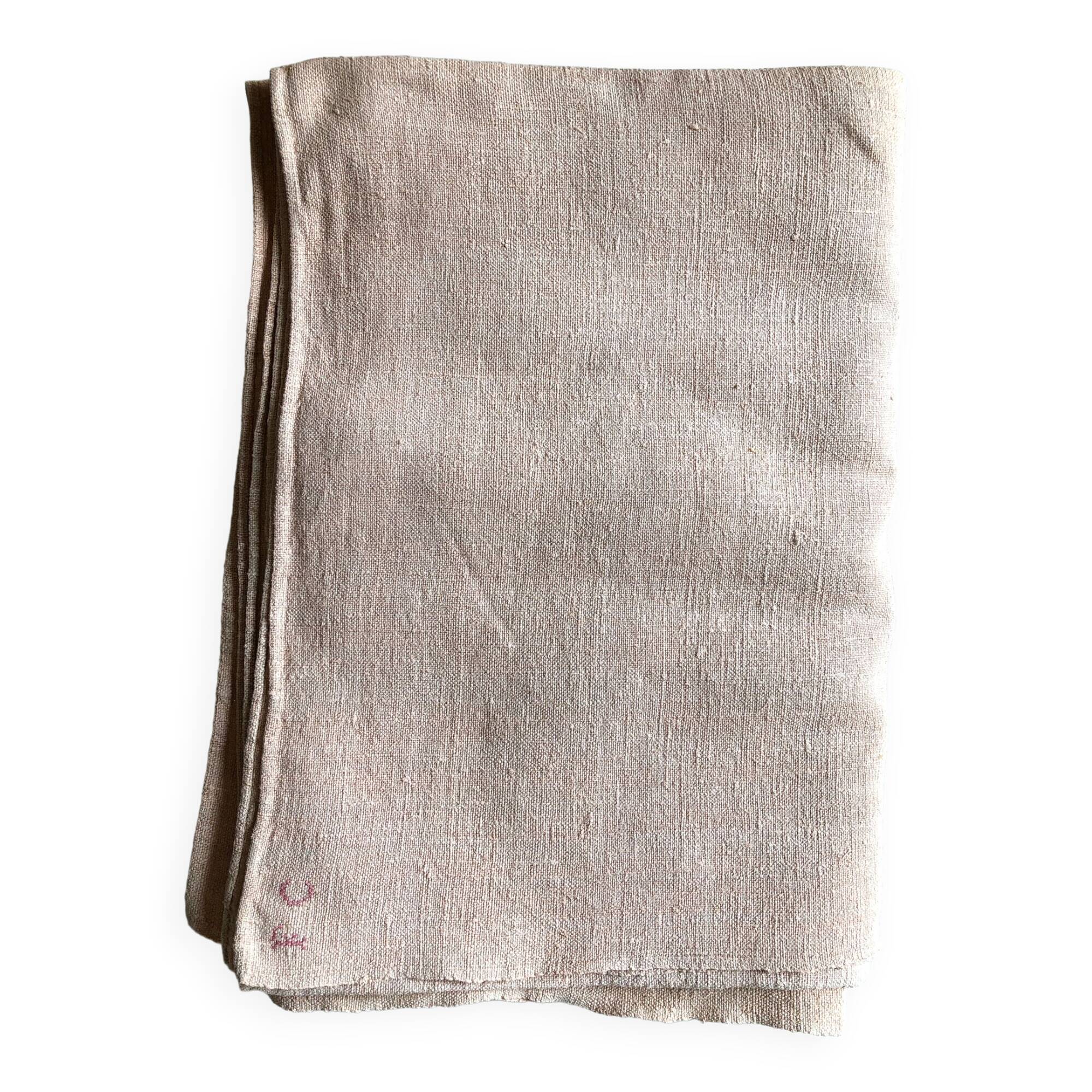 Old hemp harvest tablecloth tinted in pink tea