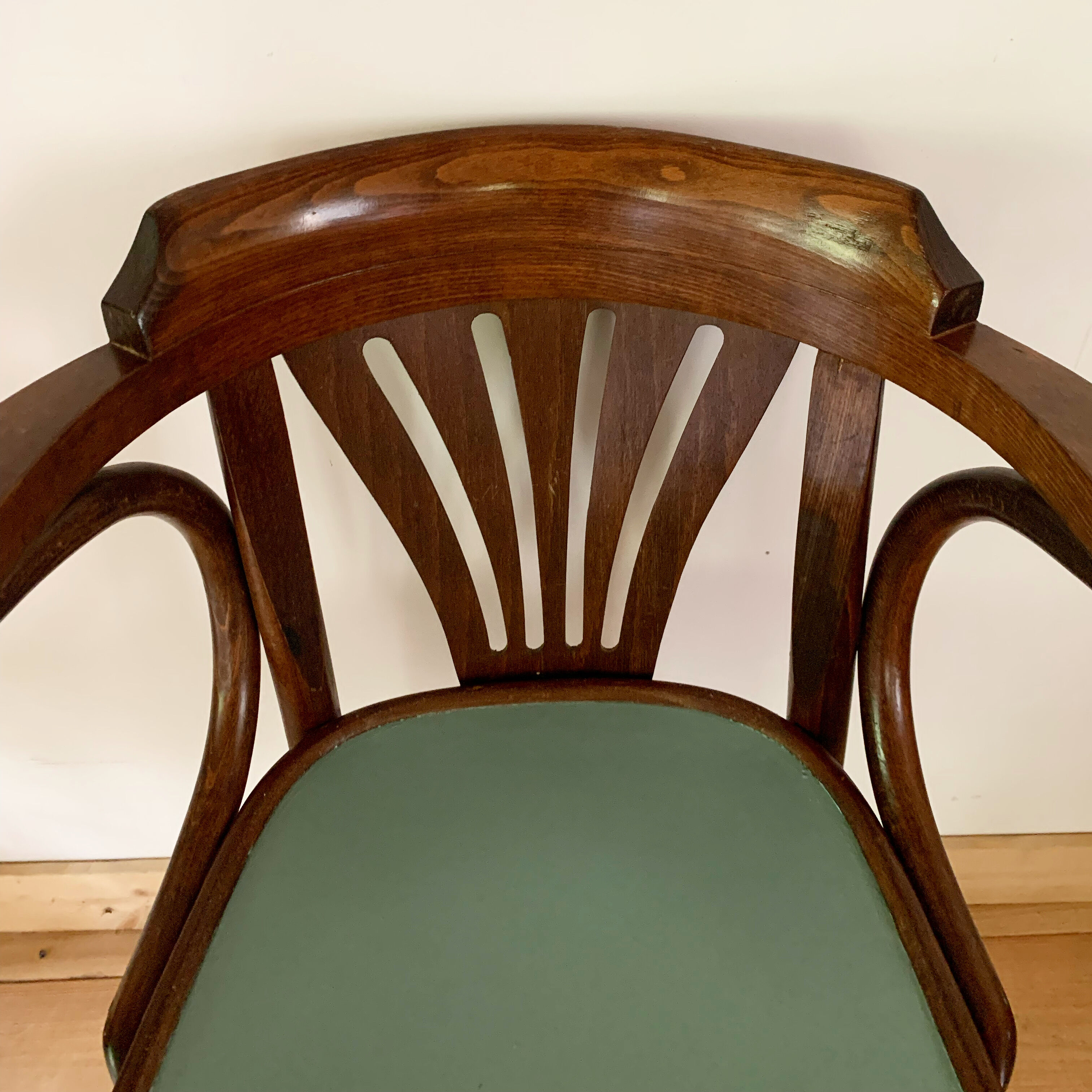 Vintage bistro chair with armrests