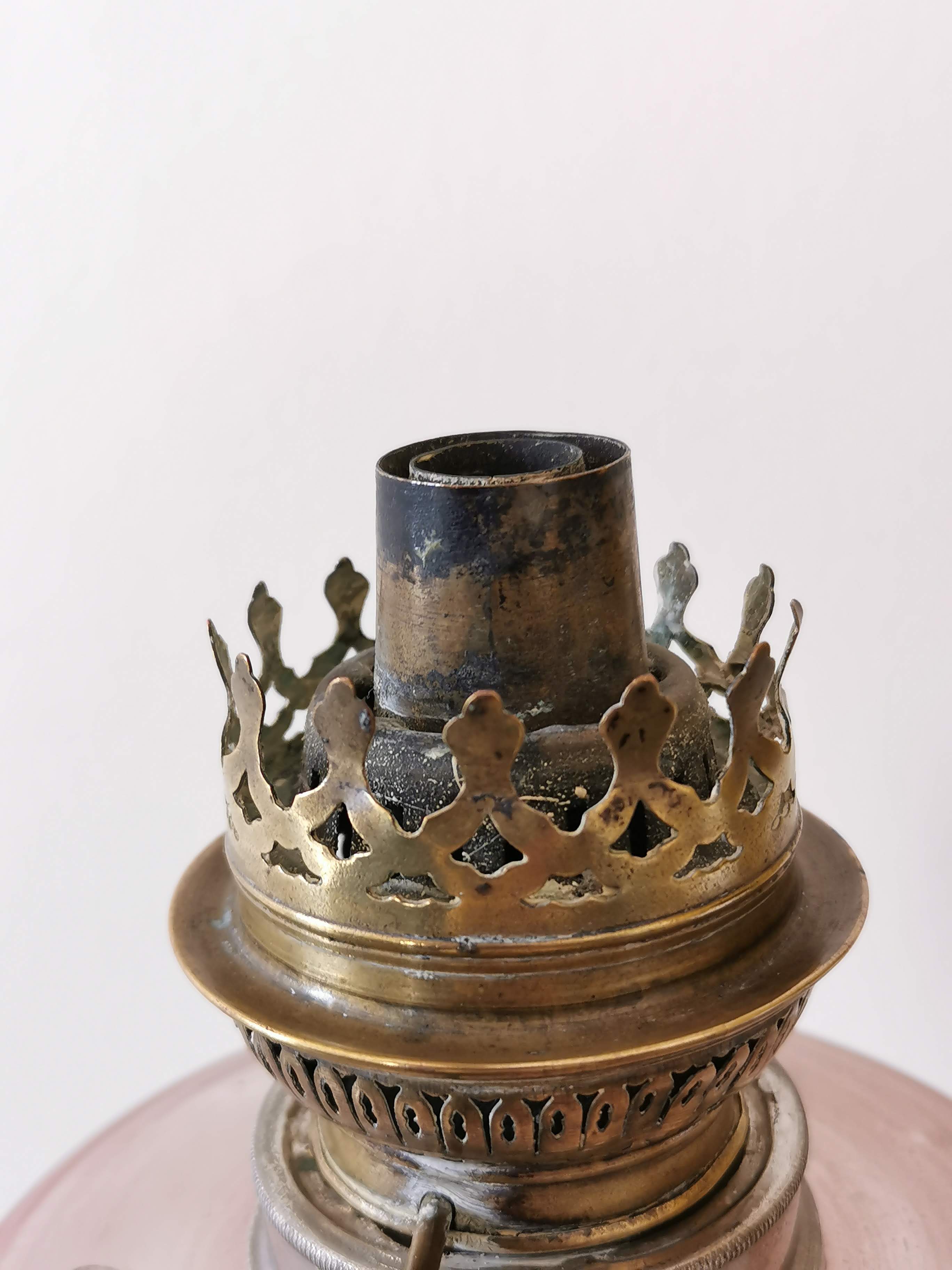 Kerosene lamp late nineteenth century mounted on Corinthian column.