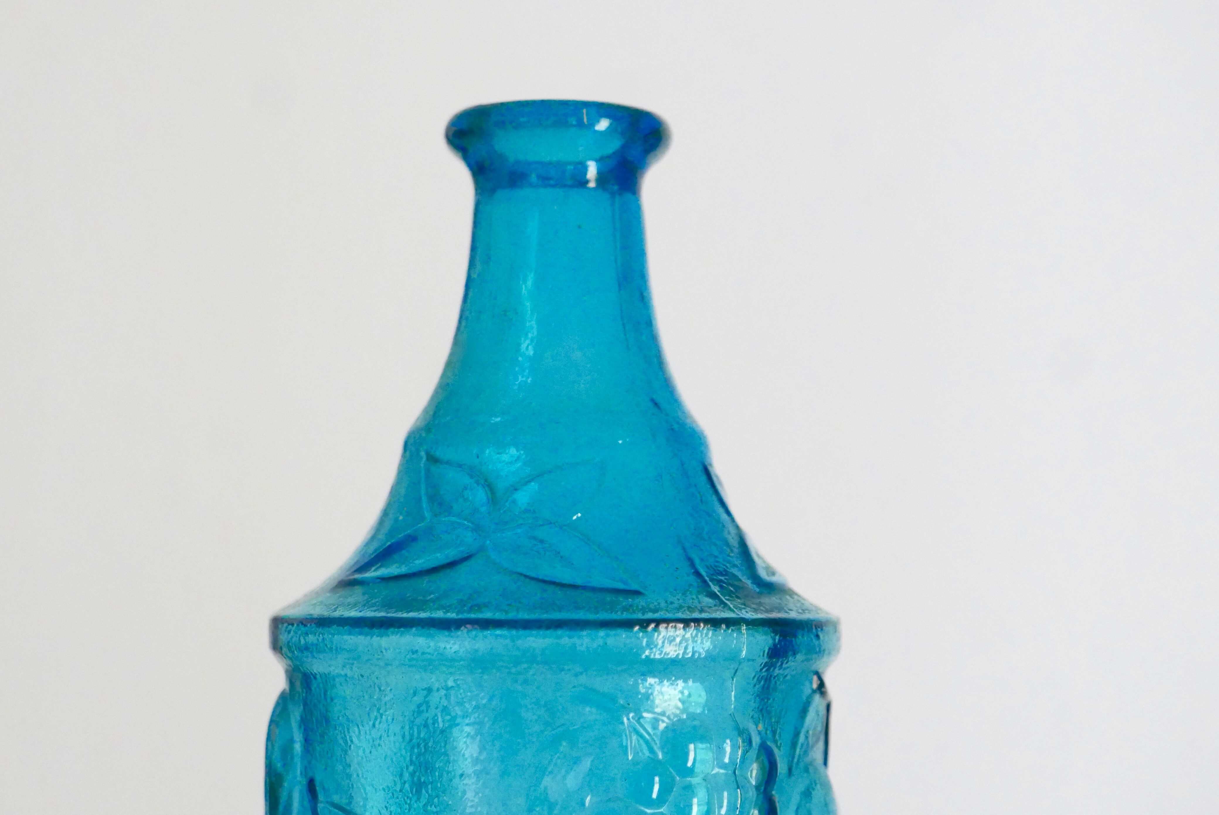 Italian bottle in blue glass, 60s