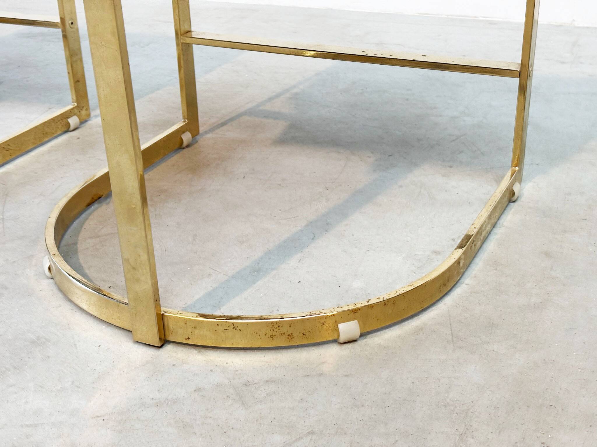 Set of four leather and brass Italian dining chairs