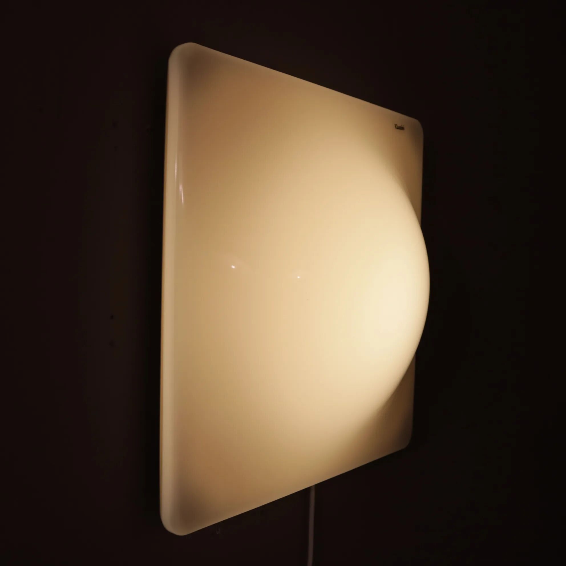 1970s "Dada" wall lamp by Harvey Guzzini for iGuzzini, Italy.
