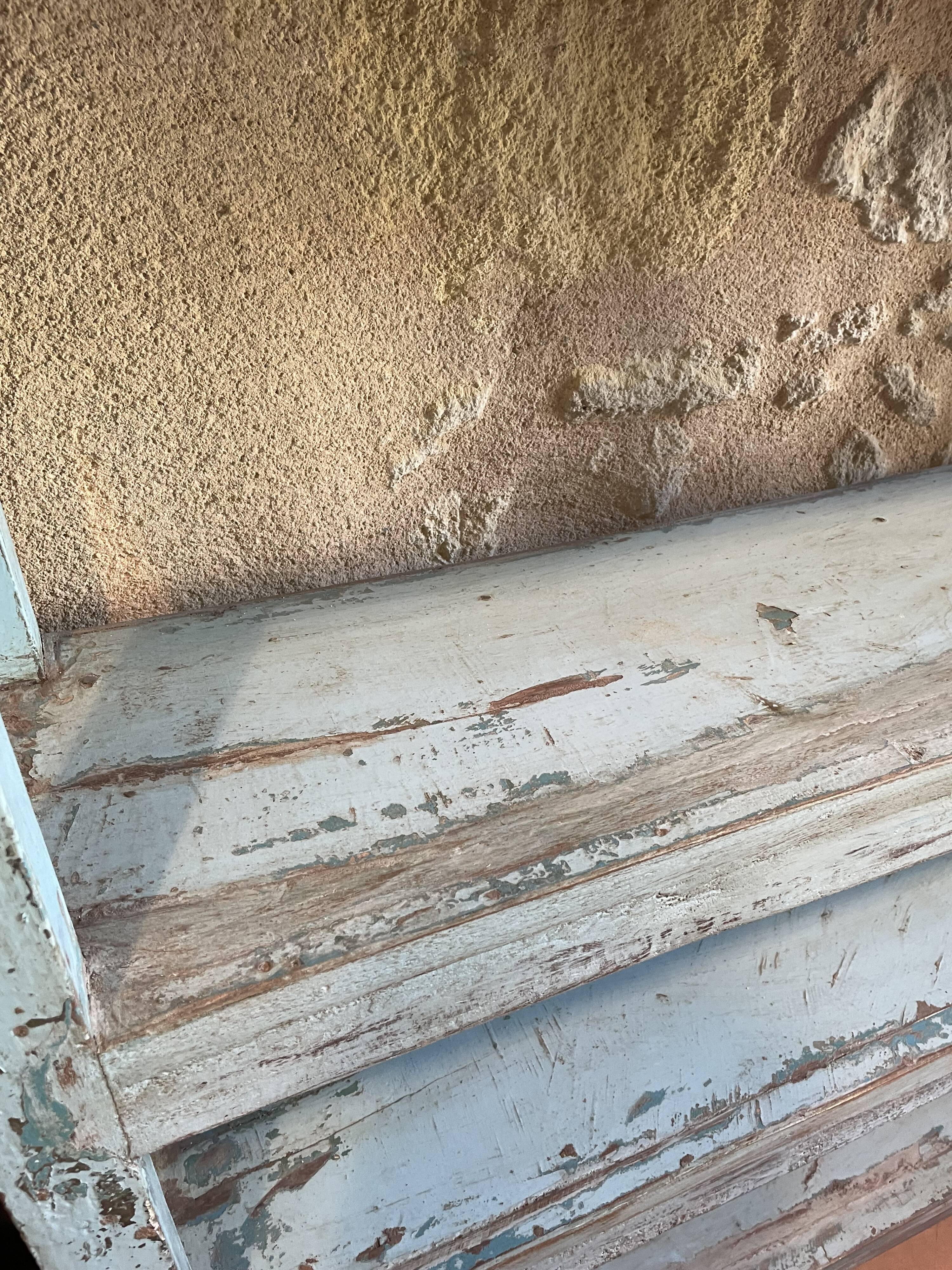 Blue lacquered teak shelves