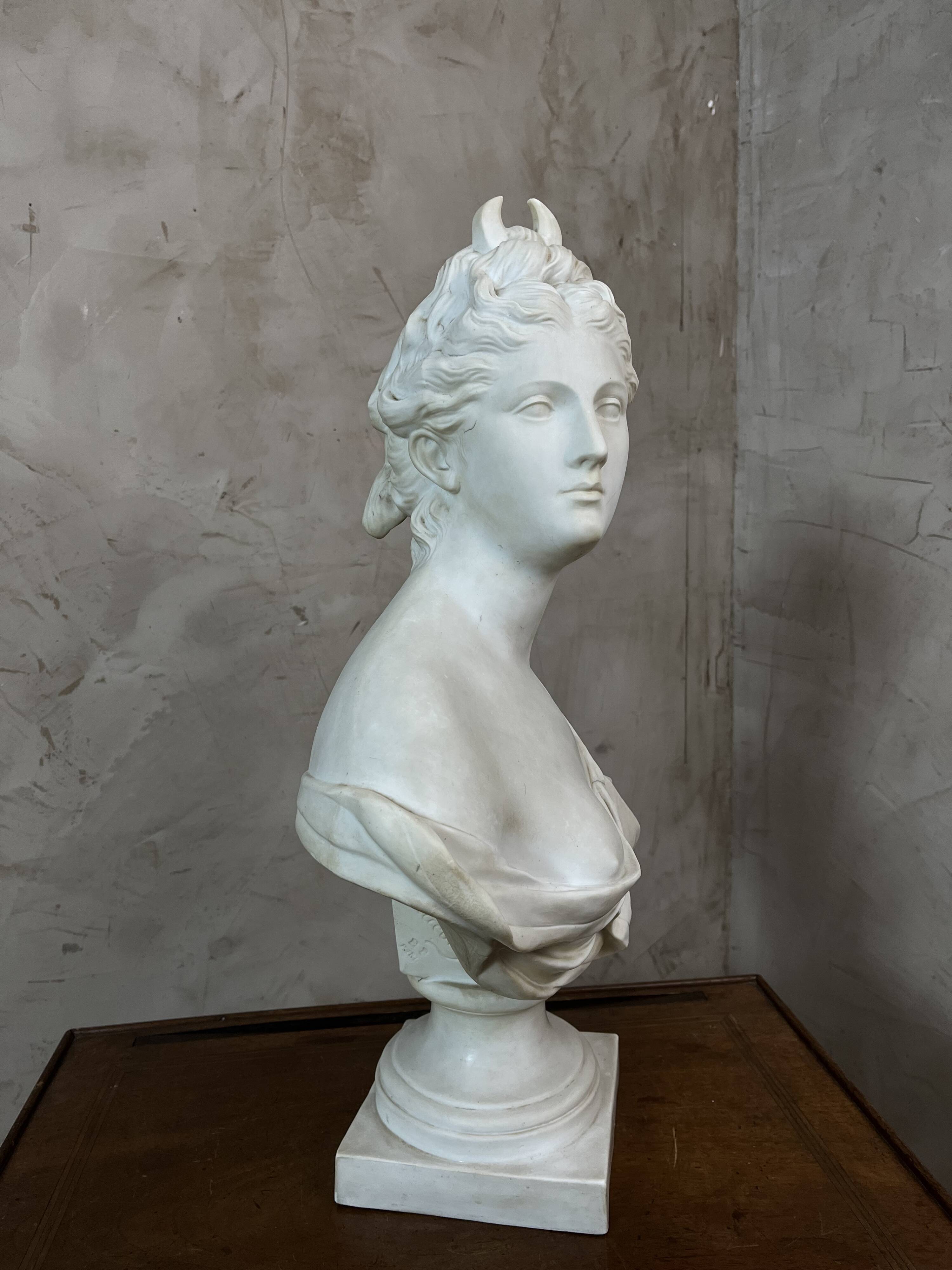 Bust of a woman in Biscuit signed