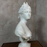 Bust of a woman in Biscuit signed