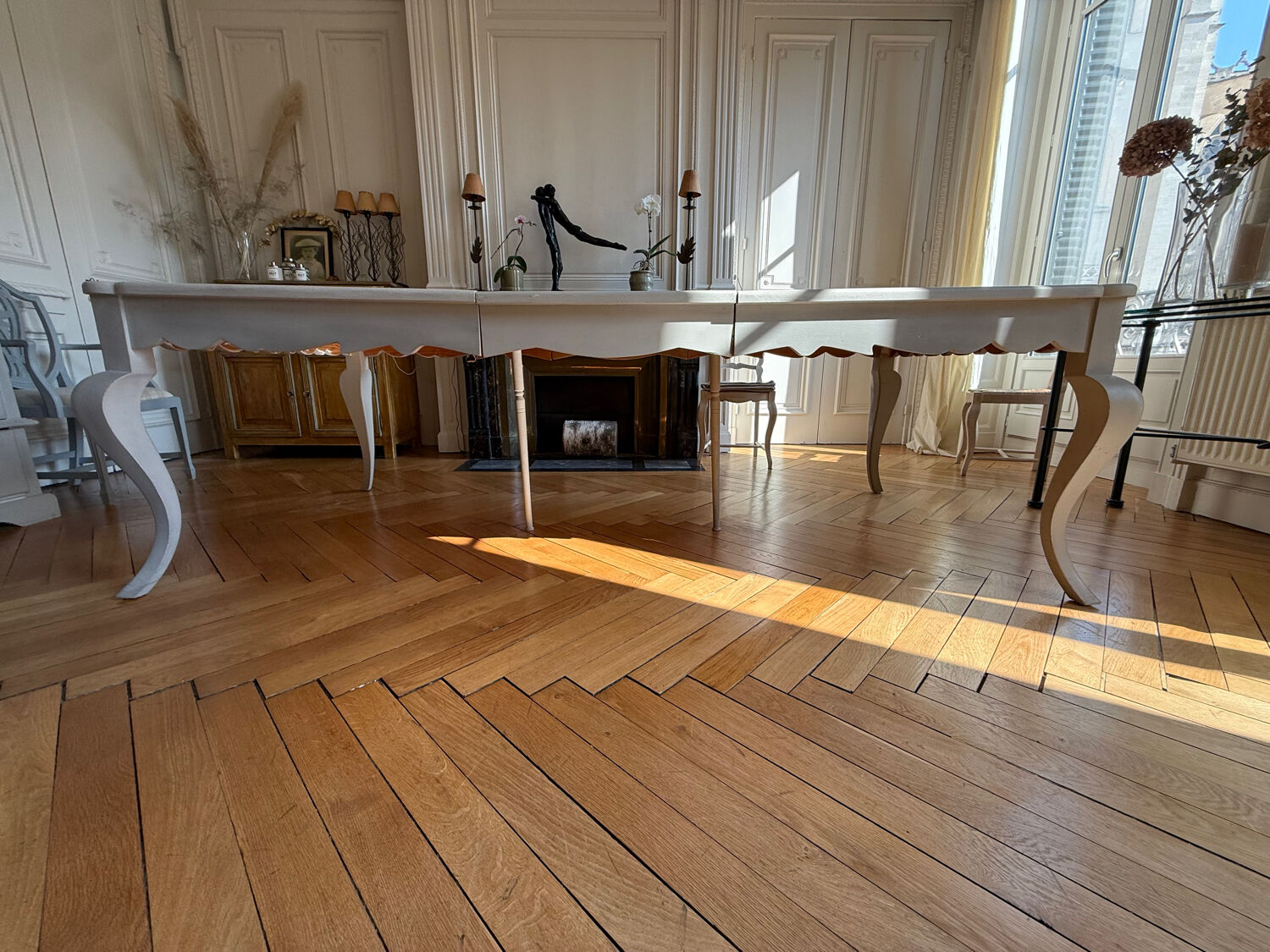 Large solid wood table made by a cabinetmaker.