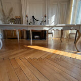 Large solid wood table made by a cabinetmaker.