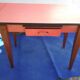 Table in red formica