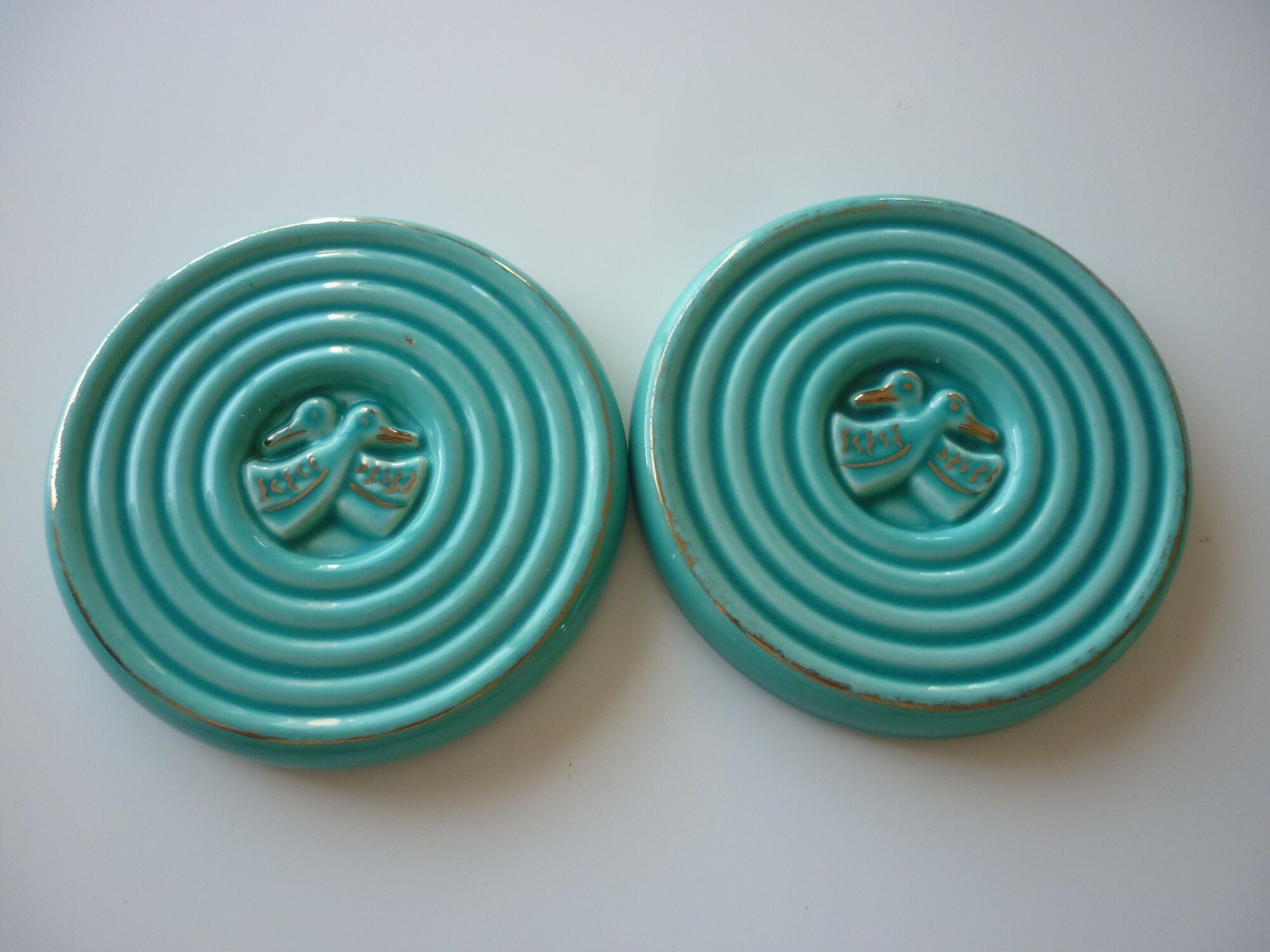 Paire de 2 sous verres/bouteilles en céramique turquoise et or