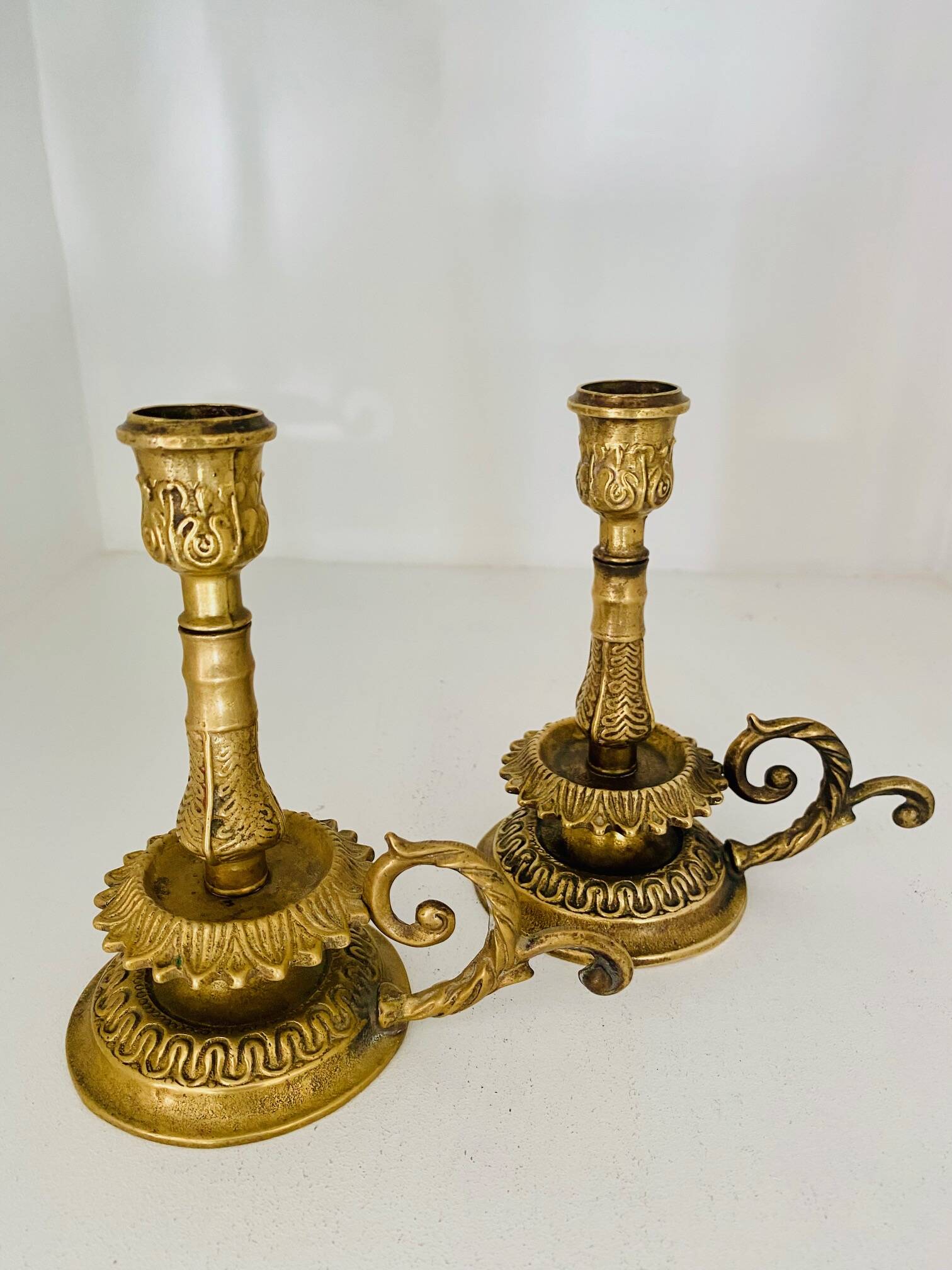 Pair of gilded brass candlesticks