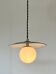 Industrial pendant light made of speckled enameled sheet metal and opaline