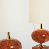 Pair of lamps in red travertine and brass 1970