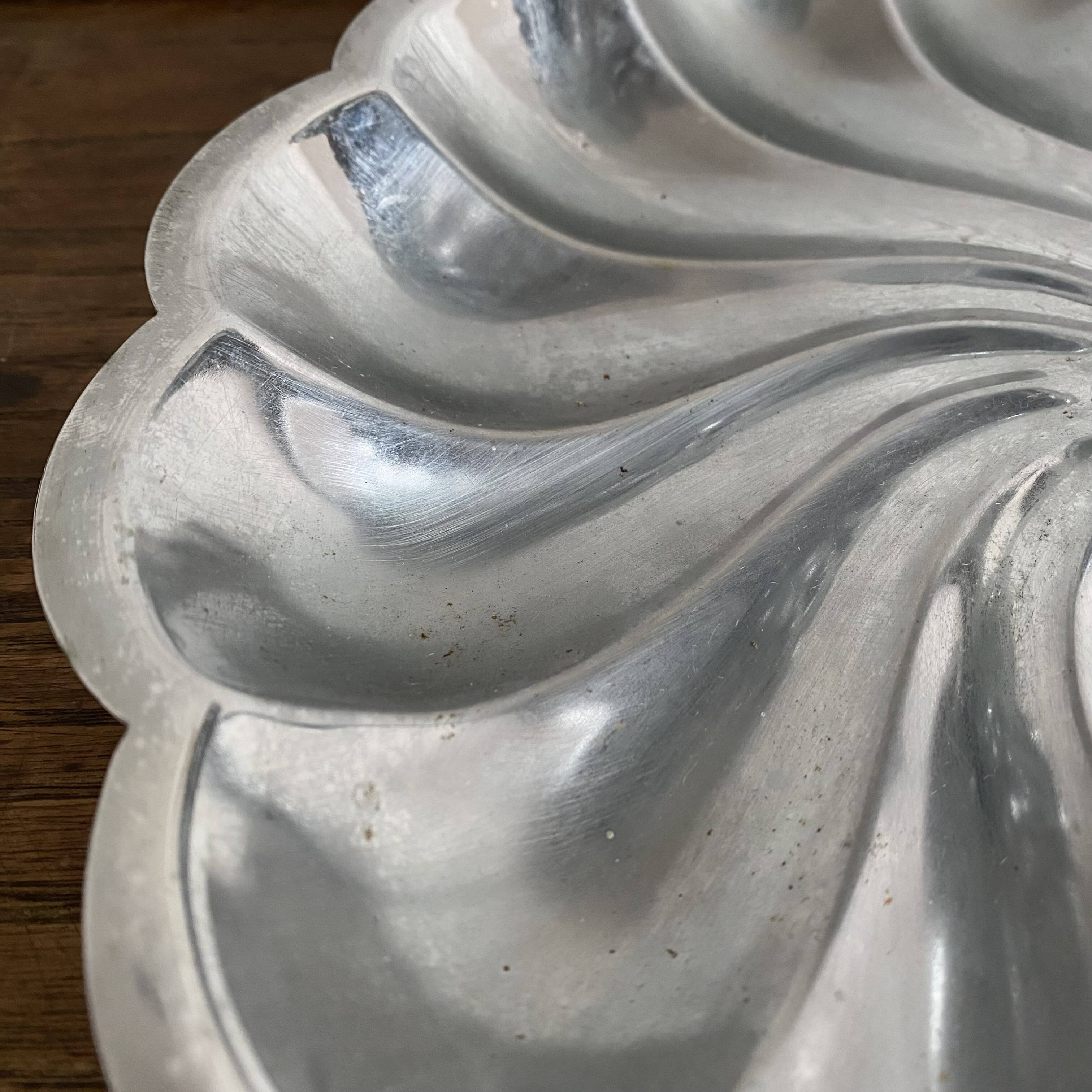 Tiered stainless steel serving platter