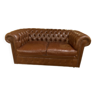 brown leather 2-seater Chesterfield sofa