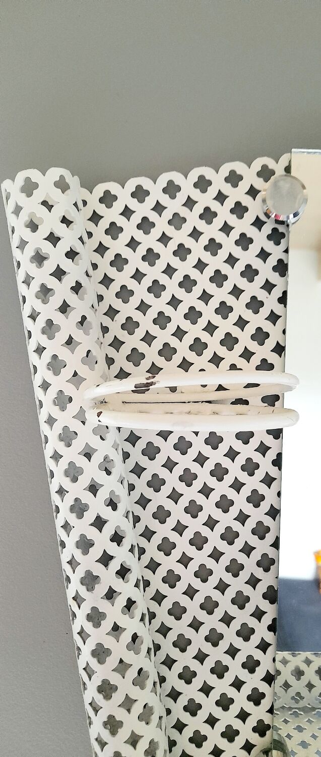 Perforated sheet metal bathroom shelf