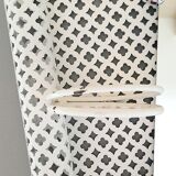 Perforated sheet metal bathroom shelf