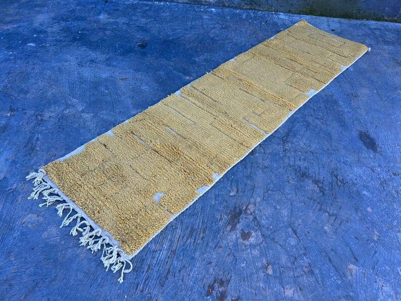 Handmade pure wool carpet in mustard yellow, size 75/300cm.